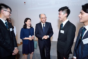 The Secretary for Transport and Housing, Mr Frank Chan Fan (centre) chatted with students about their internship experiences.