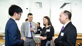 Scholarship recipient (first left) shared with officiating guest and professors his career choice of seagoing seafarer.