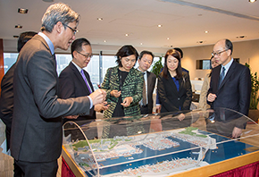 The Chairman of Hong Kong Container Terminal Operators Association, Ms Jessie Chung (middle), gave a brief on the overview of Kwai Tsing Container Terminals to the Secretary for Transport and Housing, Mr Frank Chan Fan (first right).