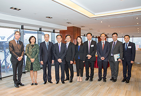 The Secretary for Transport and Housing, Mr Frank Chan Fan (third left) and the Chairman of Hong Kong Container Terminal Operators Association, Ms Jessie Chung (second left) took pictures with industry practitioners.