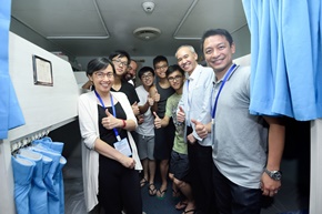 Director of Marine, Ms Maisie Cheng, J.P. (first left), Director of the Maritime Services Training Institute, Ir Mak Chiu Ki (second right) and other members of the delegation visited the students on board Yu Kun.