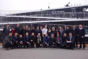 The delegation of the Hong Kong Maritime and Port Board led by the Secretary for Transport and Housing, Mr Frank Chan Fan, continued their visit to Norway today (March 14, Oslo time). Photo shows Mr Chan (back row, seventh right) and the delegation being pictured with Captain John Nauckhoff (back row, ninth right) after touring the Vision of the Fjords, a hybrid electric sightseeing vessel designed and built by Norway.