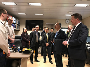 The delegation of the Hong Kong Maritime and Port Board led by the Secretary for Transport and Housing, Mr Frank Chan Fan, visited Bergen, Norway for the last leg of their Nordic tour today (March 15, Bergen time). Photo shows Mr Chan (front row, second right) and the delegation chatting with the staff of an environmental friendly cruise liner.