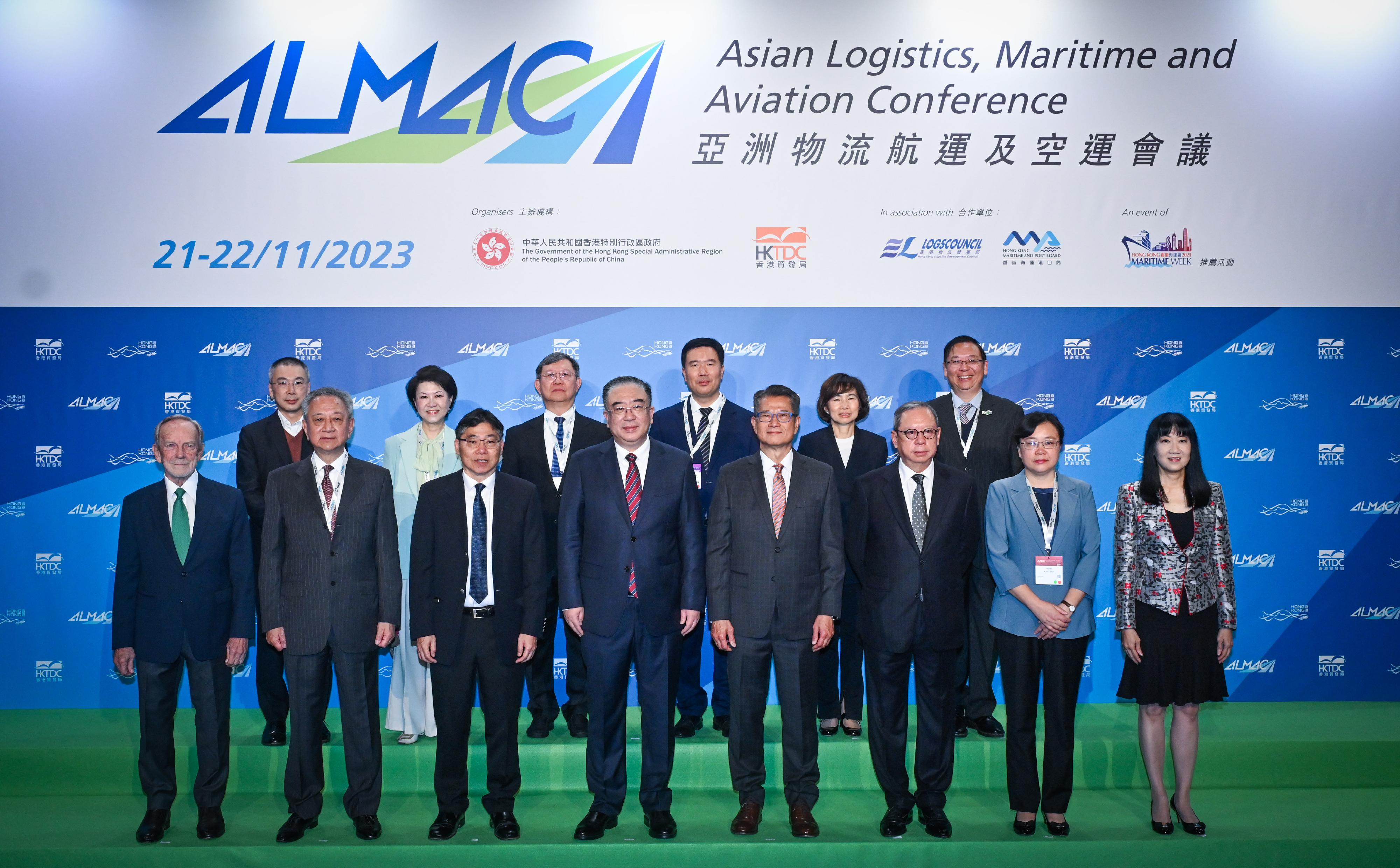 The Financial Secretary, Mr Paul Chan, attended the Asian Logistics, Maritime and Aviation Conference 2023 today (November 21). Photo shows (front row, from third left) the Secretary for Transport and Logistics, Mr Lam Sai-hung; Vice Minister of Transport Mr Fu Xuyin; Mr Chan; the Chairman of the Hong Kong Trade Development Council (HKTDC), Dr Peter Lam; Vice Mayor of Chongqing Municipal People's Government Ms Zhang Guozhi; the Executive Director of the HKTDC, Ms Margaret Fong, and other guests at the conference.